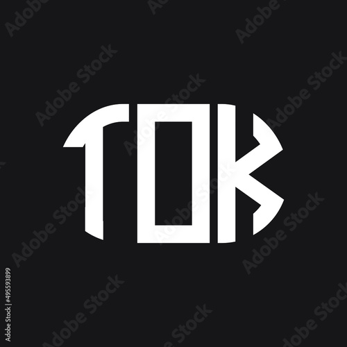 TOK letter logo design on Black background. TOK creative initials letter logo concept. TOK letter design. 
