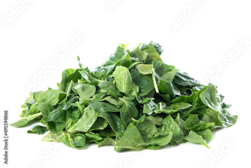 Pile of fresh green baby spinach leaves isolated on white background