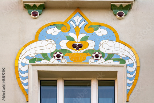 Art nouveau facade decoration, white birds made of glazed tiles on old house in Bratislava, Slovakia