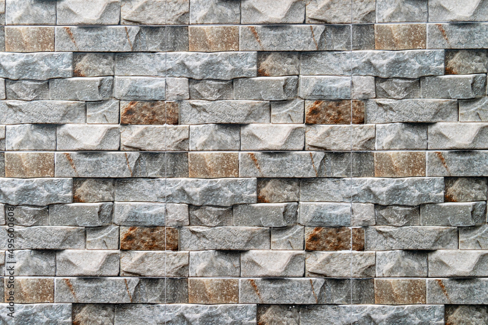 Background and textured of brick pieces with stone pattern. Use for wall of house or fence wall. Background and textured of brick pieces with stone pattern. Use for wall of house or fence wall.
