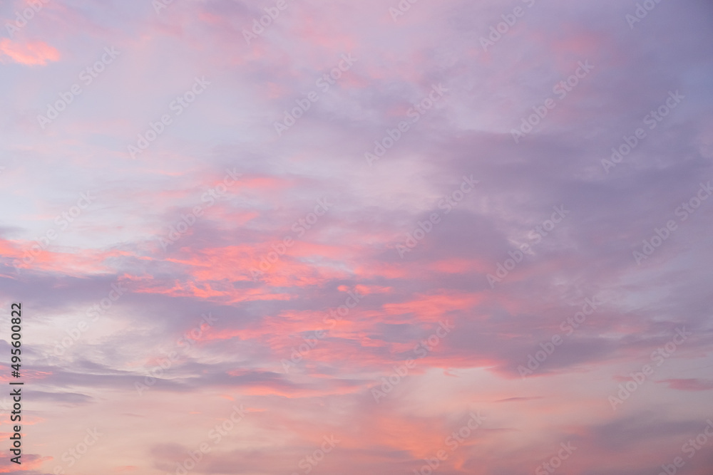 Beautiful atmospheric pink sky. Clouds at sunset. Abstract natural background. Beautiful atmospheric pink sky. Clouds at sunset. Abstract natural background.
