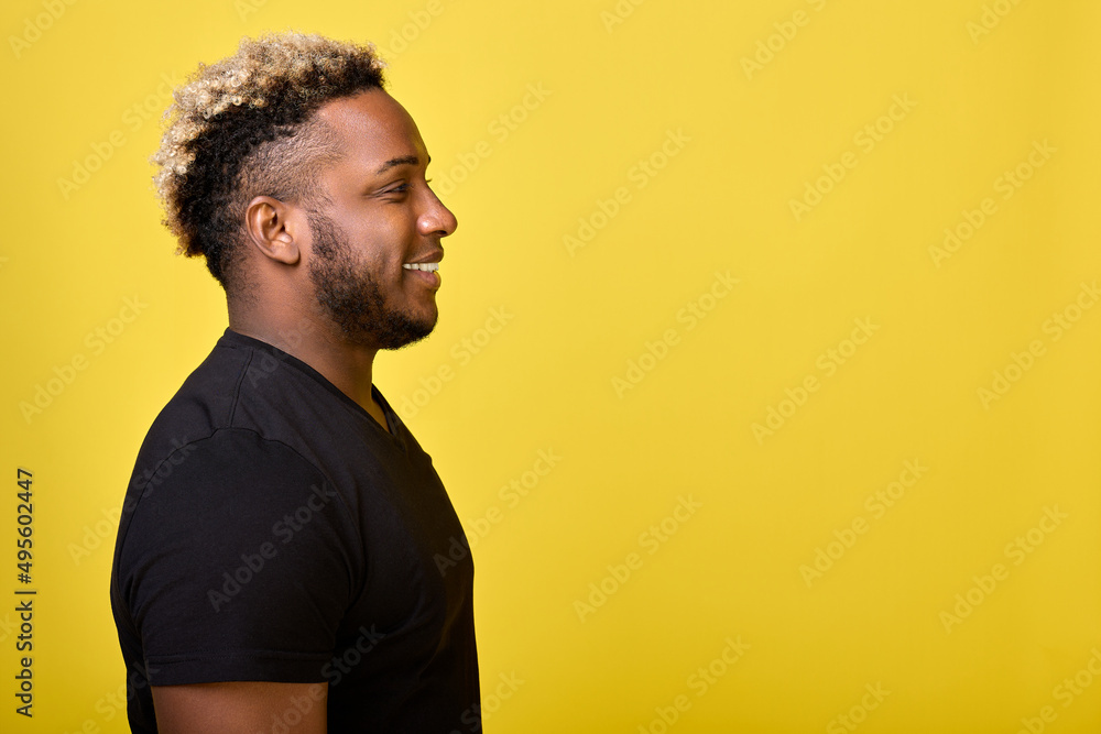 Dark-skinned guy with smile stands device for measuring growth during medical examination in the doctor's office. African-American is photographed on new foreign passport and other official documents Dark-skinned guy with smile stands device for measuring growth during medical examination in the doctor's office. African-American is photographed on new foreign passport and other official documents