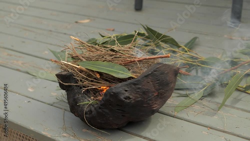 Gum Leaves Burn During Australian Aboriginal Ancient Smoking Ceremony photo