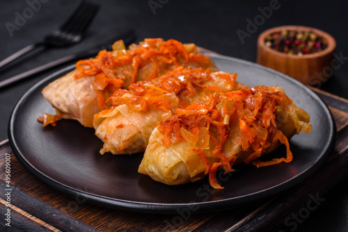 Cabbage rolls stuffed with ground beef and rice in tomato sauce