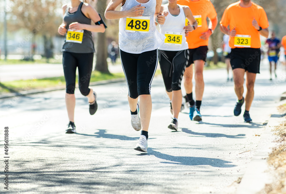 Marathon running race, people feet on road. Marathon running race, people feet on road.
