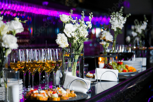 Decorated catering banquet table with different food appetizers assortment on a party