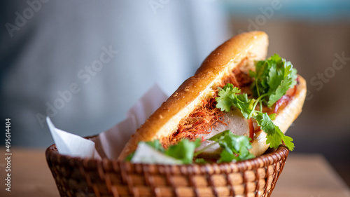 Banh Mi Sandwich aus Vietnam als Street Food vom Foodtruck auf einem Straßenfest für die Hand in Vietnam photo