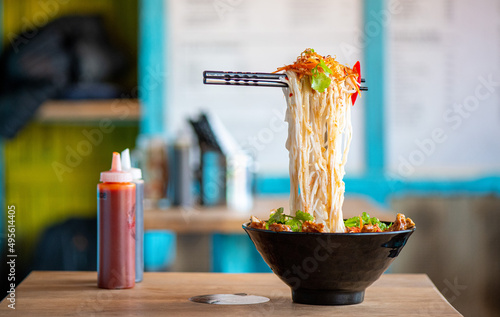 Flying Noodles in einem vietnamesischem Street Food Restaurant in Vietnam  photo