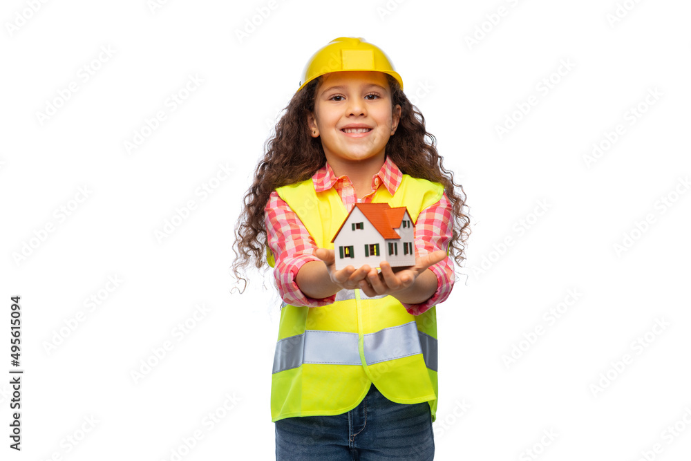 building, construction and real estate concept - smiling little girl in protective helmet and safety vest over holding living house model white background building, construction and real estate concept - smiling little girl in protective helmet and safety vest over holding living house model white background