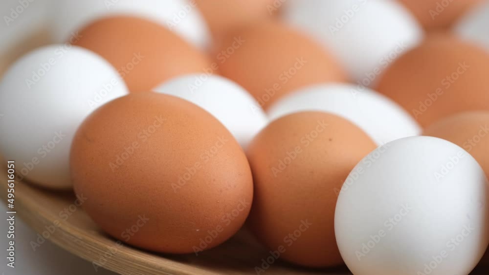 Chicken egg, rotation shot, Chicken fresh raw eggs.Healthy fresh food ingredients for breakfast. Animal products. Grocery. Chicken farm fresh eggs Chicken egg, rotation shot, Chicken fresh raw eggs.Healthy fresh food ingredients for breakfast. Animal products. Grocery. Chicken farm fresh eggs