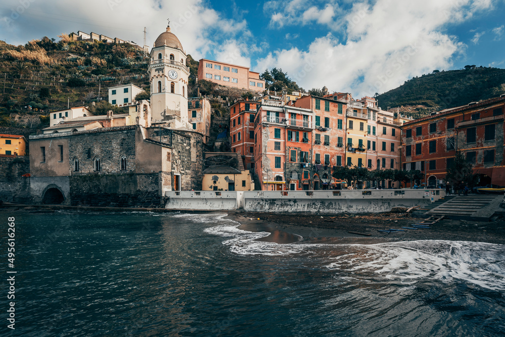 view of the town of vernazza by the sea in italy