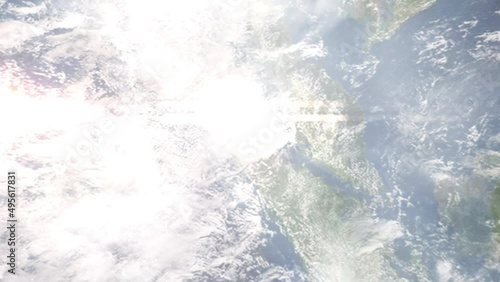 Earth zoom in from outer space to city. Zooming on Binjai, North Sumatra, Indonesia. The animation continues by zoom out through clouds and atmosphere into space. Images from NASA
