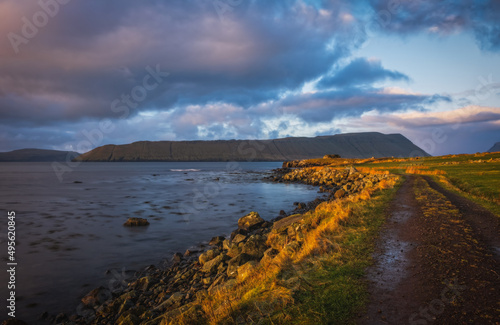 November morning in Streymoy Island. Picturesque sunrise on outskirts of Kirkjubour village, Faroe Islands, Denmark, Europe. Beauty of nature concept background.
