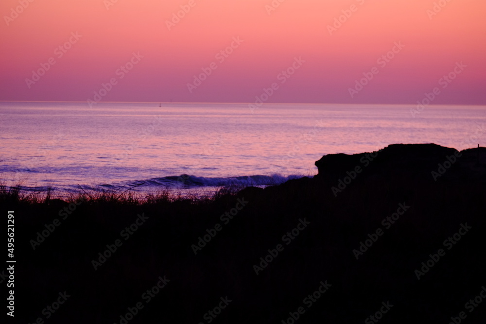 A nice landscape and sunset from the  rocky coast of Batz-sur-Mer. March 2022, la Govelle Beach, France.