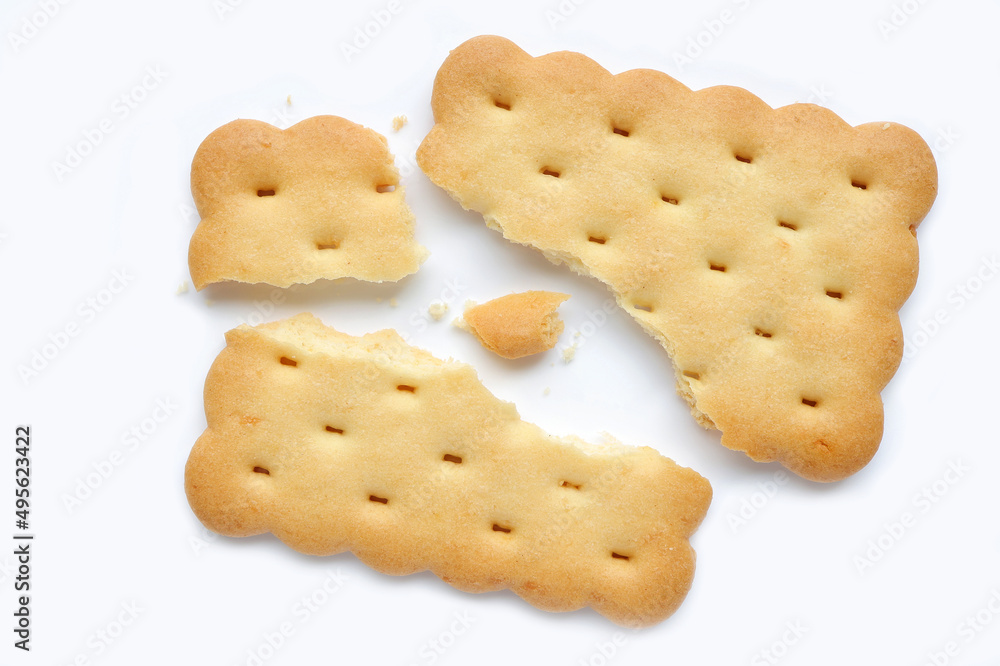 Broken cracker. Square crackers isolated on white background. crushed dry cracker cookies. Broken cracker. Square crackers isolated on white background. crushed dry cracker cookies.