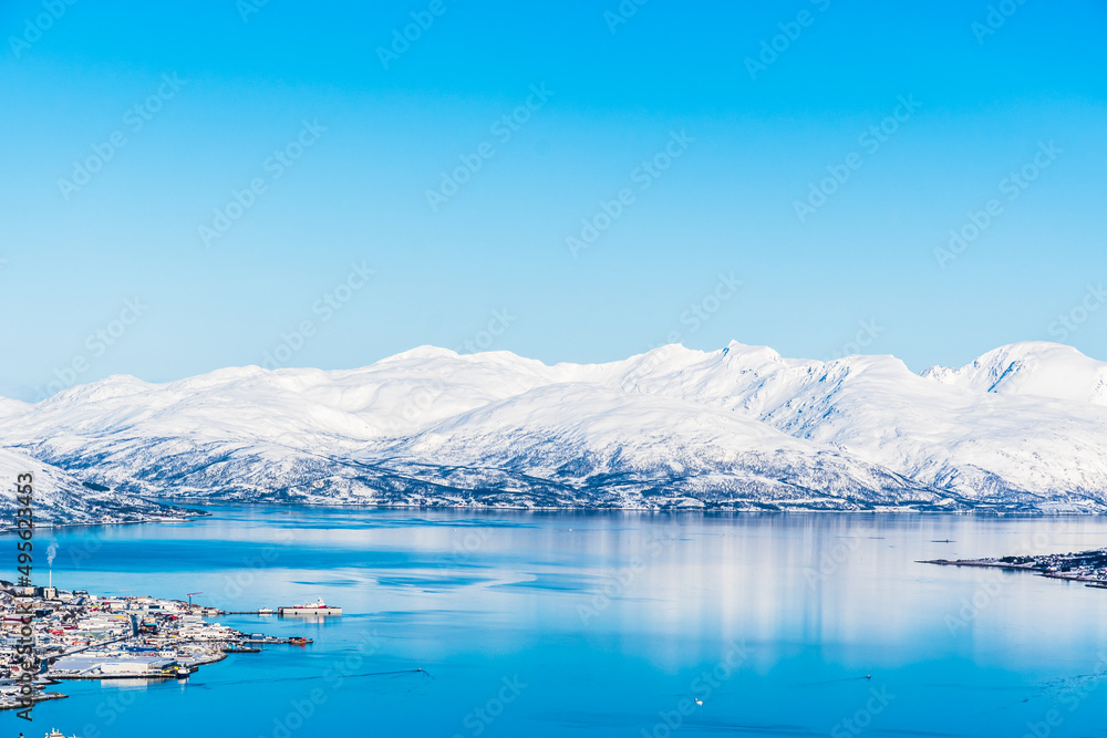 View from Mount Storsteinen on the Norwegian mountains around the city of Tromso, copy space