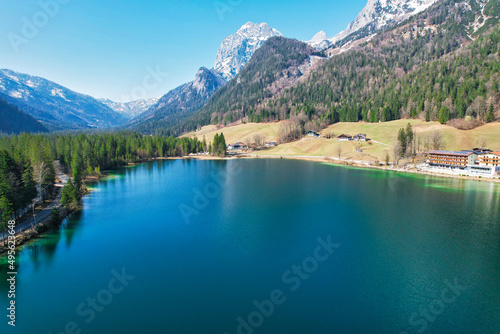 Beautiful green lake Hintersee Ramsau Berchtesgardner Land Alps surrounded by mountains and forest