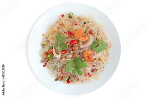 Glass noodle salad, delicious spicy glass noodles with minced pork, dried shrimp, peanut and vegetable on the white background with clipping path.thai called " yum woon sen" serve in white dish.