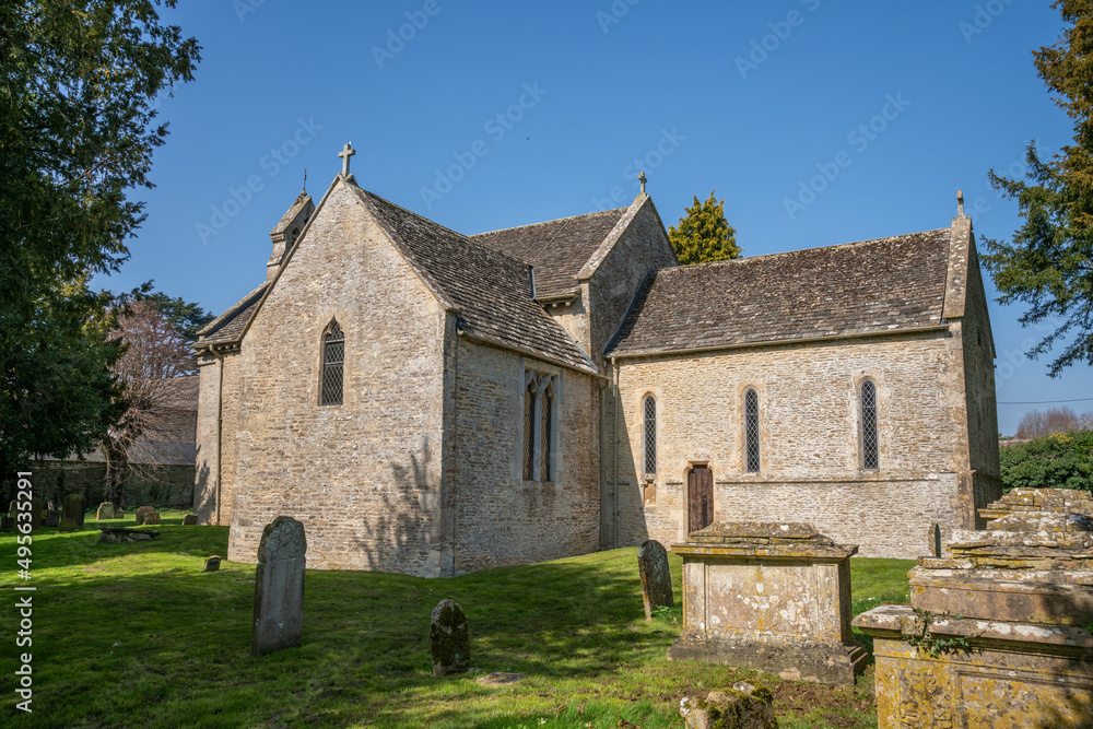St Peter's 12th Century Saxon church in the village of Southrop, The Cotswolds, England, United Kingdom