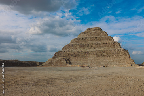 Majestic View to the Step Pyramid of Djoser under blue sky  is an archaeological site in the Saqqara necropolis  northwest of the city of Memphis  Egypt