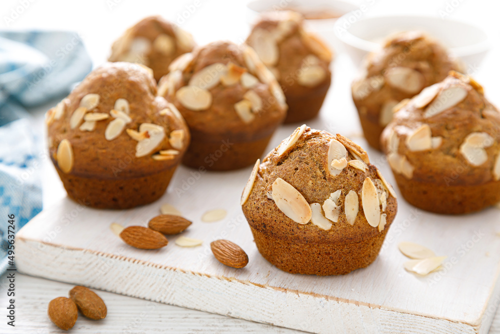 Muffins with flaked almond nuts. Cupcakes with nut chips Muffins with flaked almond nuts. Cupcakes with nut chips
