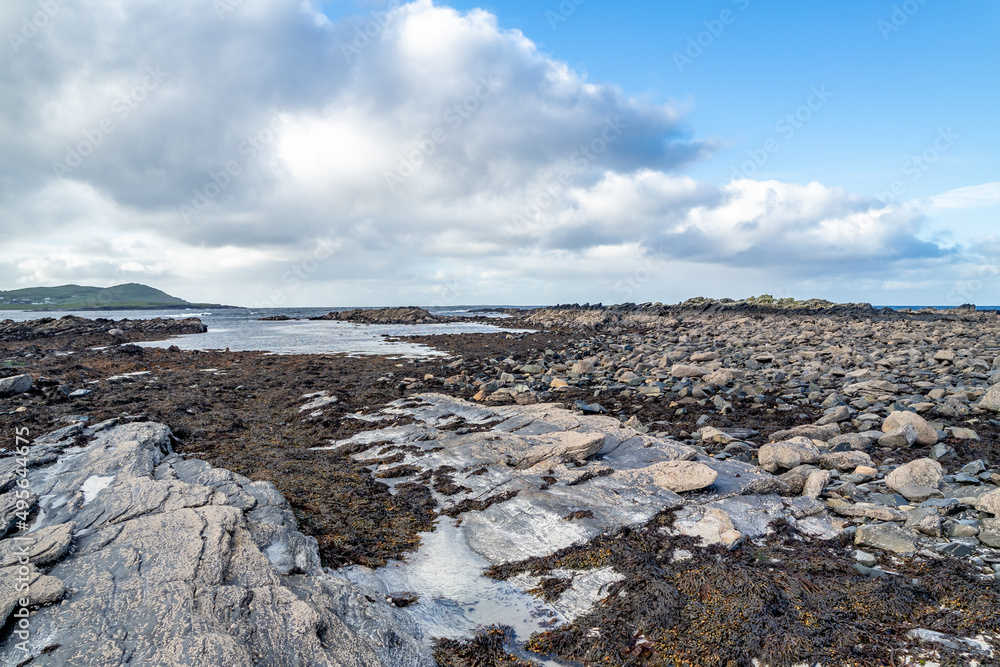 The rocks of Carrickfad by Portnoo at Narin Strand in County Donegal Ireland The rocks of Carrickfad by Portnoo at Narin Strand in County Donegal Ireland