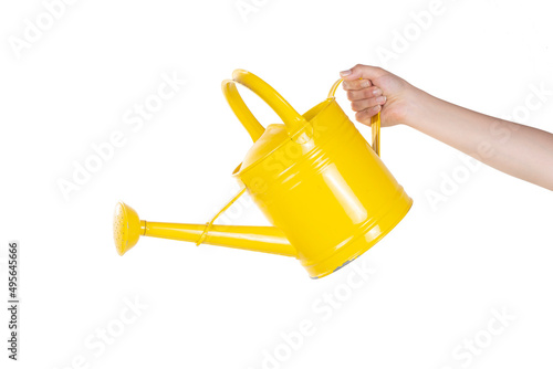 Female Hand is Holding A Watering Pot Something on Isolated White Background