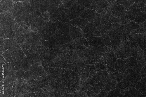 Dark gray rough concrete wall texture background