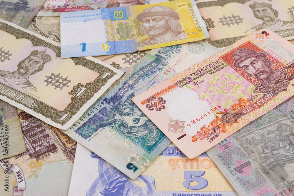 Ukrainian hryvnia, background. A lot of money for the background. Ukrainian money of different time Ukrainian hryvnia, background. A lot of money for the background. Ukrainian money of different time