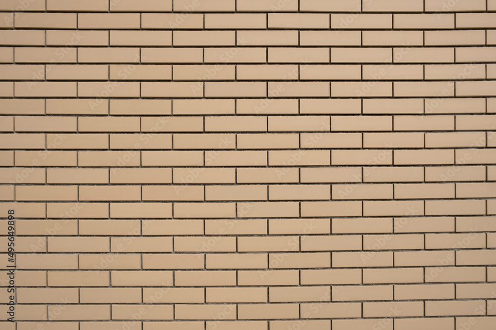 Brick wall of light yellow colour Brick wall of light yellow colour