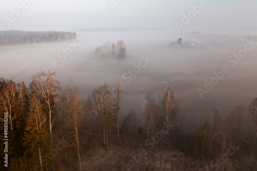 Aerial: countryside living on a misty morning