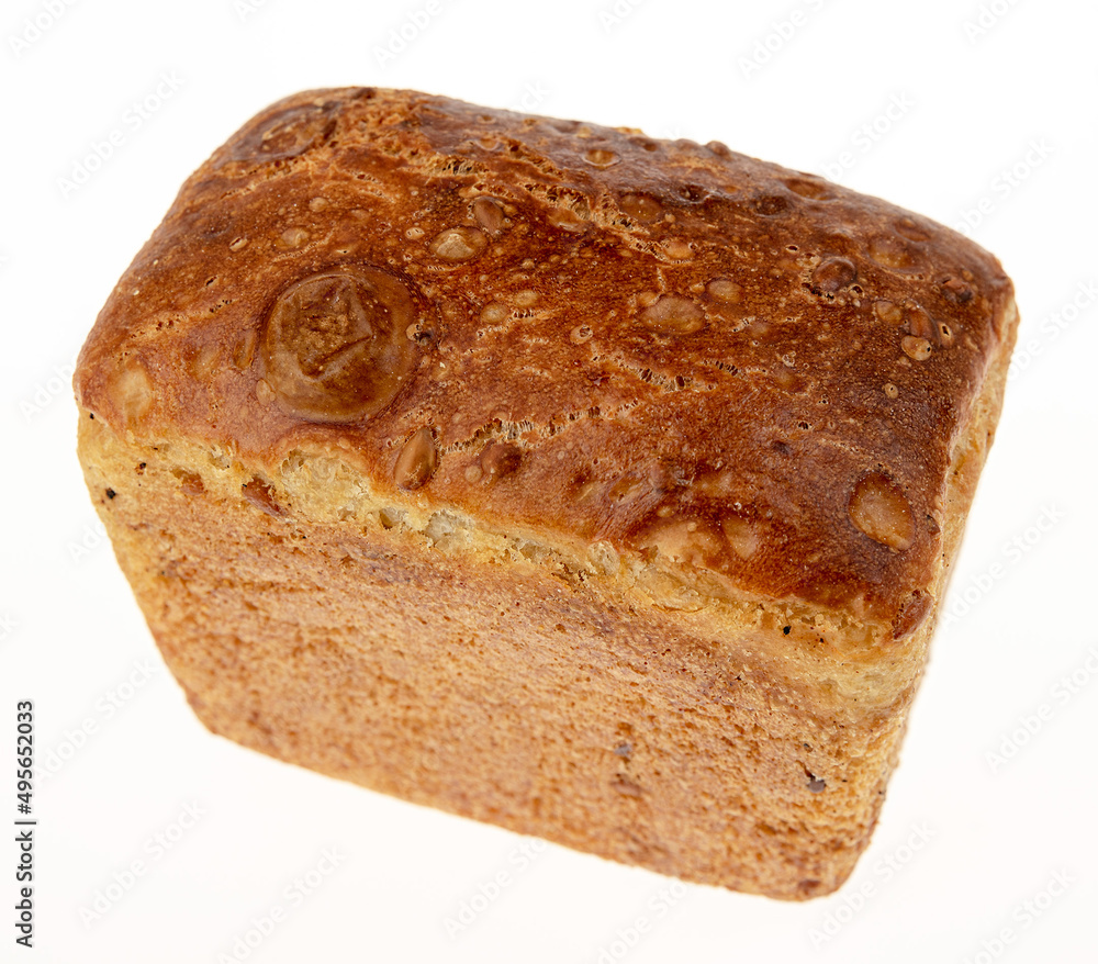 Wheat bread with different seeds on a white background. Top view Wheat bread with different seeds on a white background. Top view