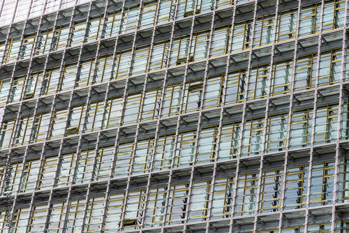 Louvre windows climate control on building facade © aph