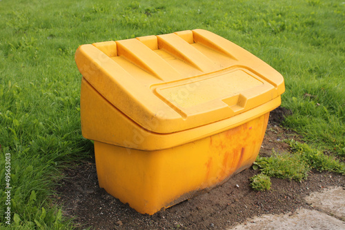 Road salt grit bin for Britain's next cold snap isolated with copy space