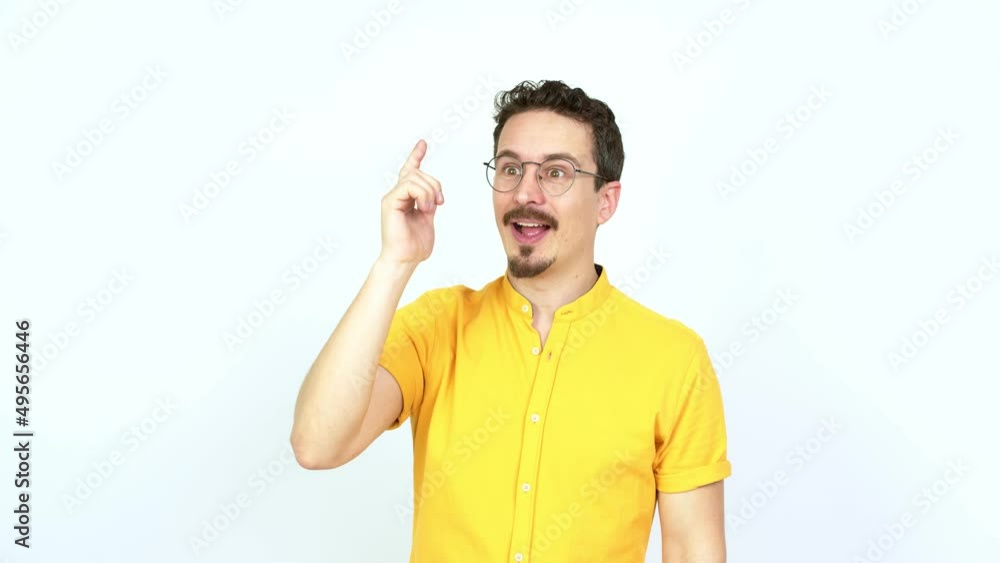 Man intending to realizes the solution while lifting a finger up over isolated background Man intending to realizes the solution while lifting a finger up over isolated background