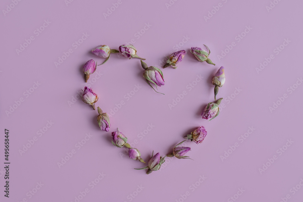 Heart of flowers on a pink background. Heart of flowers on a pink background.