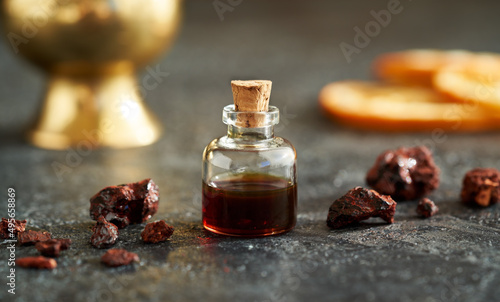 Sangre de drago oil in a bottle with dragon's blood resin photo