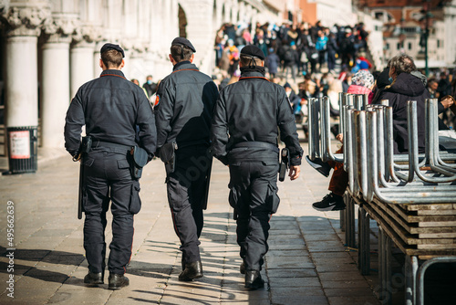 Venice Italy - February 28, 2022 - Policemen on patrol in San Marco square during the Venetian carnival