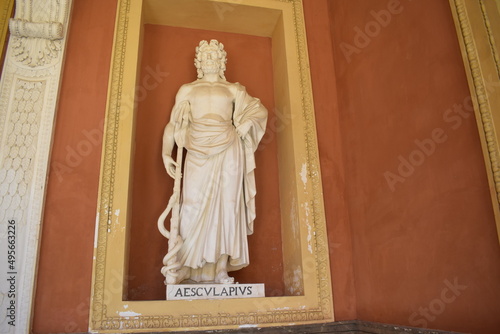 White statue of Asclepius, a hero and god of medicine in ancient Greek religion and mythology, inside the Orto Botanico di Palermo (Palermo Botanical Garden) photo