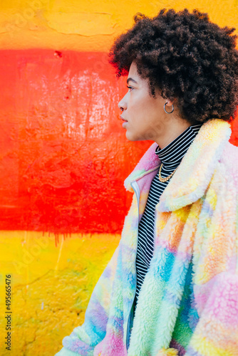 Profile portrait young black woman posing outdoor