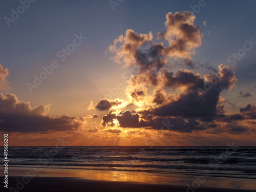 Scenic view of the Monte Clerigo Beach in Algarve, Portugal at sunset