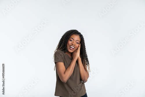 Beautiful african american happy woman on white background