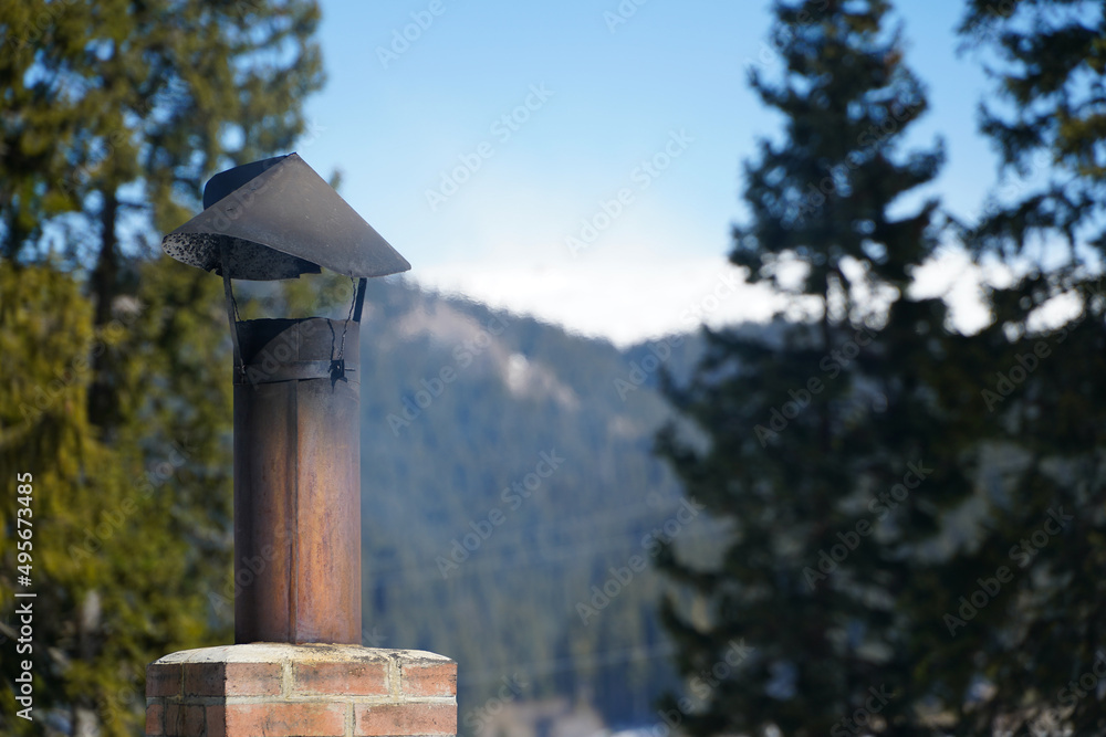 the chimney of a barbecue. photo during the day. the chimney of a barbecue. photo during the day.