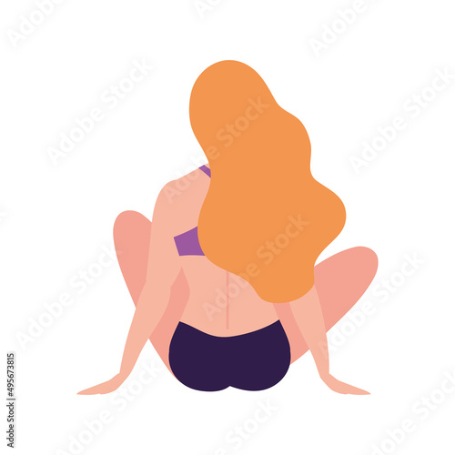 woman seated with swimsuit