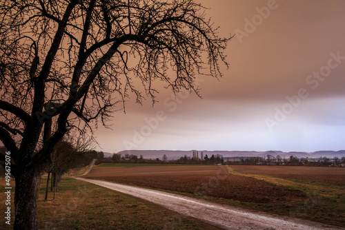 Saharan Air layer in Baden-Württemberg, Germany, colouring the sky in an orange-ochre colour. March 2022