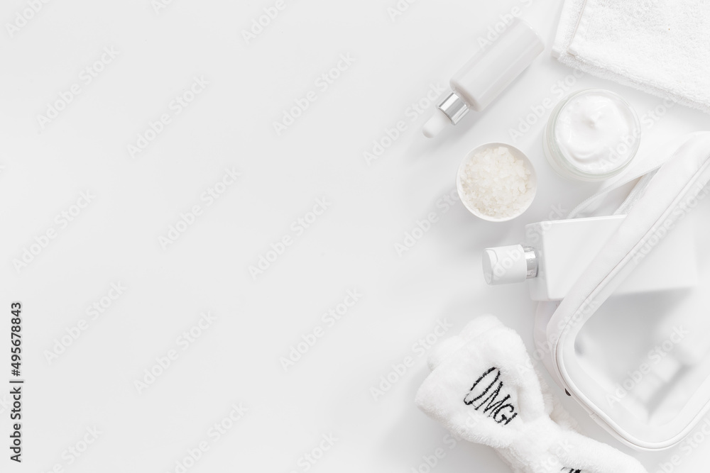 Cosmetic bag with white cosmetic products, top view Cosmetic bag with white cosmetic products, top view