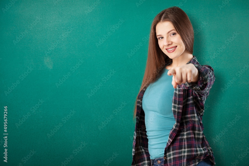 Happy afro girl smiling. Portrait of young american woman standing with hands on waist and looking at camera. Happy afro girl smiling. Portrait of young american woman standing with hands on waist and looking at camera.