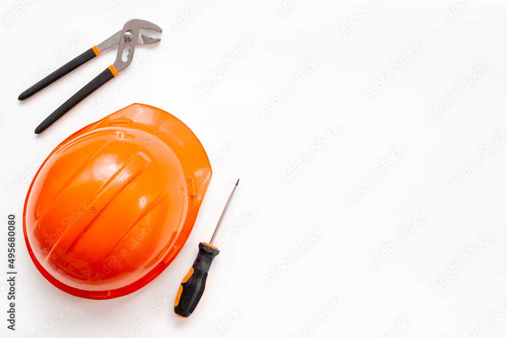 Tools with engineer safety construction helmet top view Tools with engineer safety construction helmet top view
