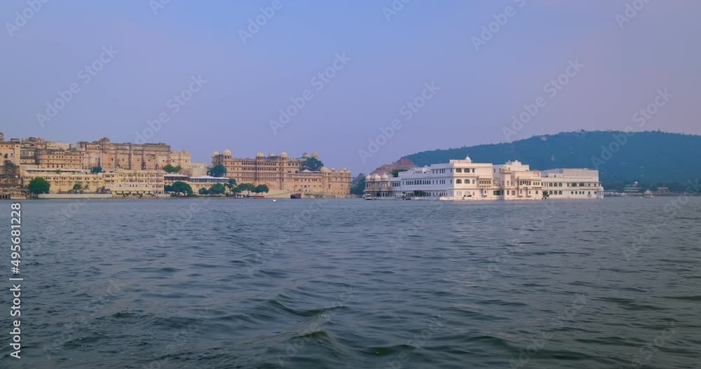 Udaipur City Palace and Lake Palace view from lake Pichola. Rajput architecture of Mewar dynasty rulers of Rajasthan. Udaipur, India Udaipur City Palace and Lake Palace view from lake Pichola. Rajput architecture of Mewar dynasty rulers of Rajasthan. Udaipur, India