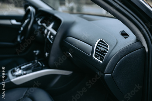 Car air conditioning systems and airbag panel. Interior detail of auto. Copy space background